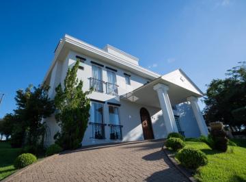 Casa · 299m² · 4 Quartos · 2 Vagas · Casa com 04 suítes, piscina aquecida e alto padrão no Condomínio Serra Azul!