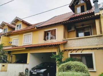 Casa · 111m² · 3 Quartos · 2 Vagas · Casa em condomínio com 03 dormitórios, 01 suíte e 02 vagas de garagem no bairro Espirito Santo em Po
