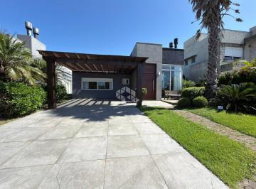Casa · 166m² · 4 Quartos · 2 Vagas · Casa de 4 suítes mobiliado com vaga de garagem em Condomínio Fechado em Capão da Canoa!
