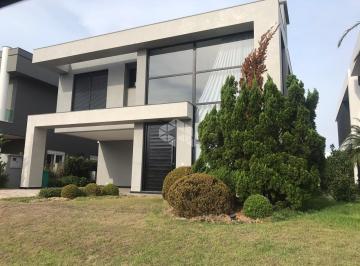 Apartamento · 449m² · 5 Quartos · 2 Vagas · Sobrado no condomínio fechado Enseada, com 5 suítes, sendo 2 master e 1 térrea, mobiliada e decorada