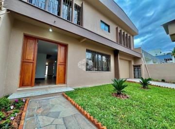 Casa · 250m² · 3 Quartos · 2 Vagas · Casa à venda com 3 Dormitórios e 250 m² no bairro Partenon