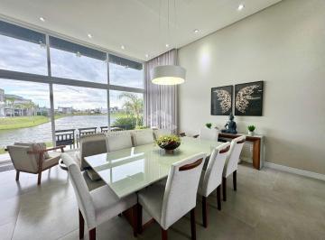 Apartamento · 174m² · 3 Quartos · Casa no condomínio Riviera com 3 suítes, beira lago, mobiliada e decorada com 174m² privativos em Xa
