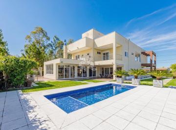 Casa · 592m² · 4 Quartos · 3 Vagas · Casa de Alto Padrão com 591,58 m², 4 Suítes e Piscina no Ecovillage Viamão 2