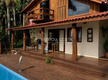 Casa · 223m² · 4 Quartos · 4 Vagas · Duas Casas com Vista para a Lagoa na Encantada – Oportunidade Única em Garopaba!