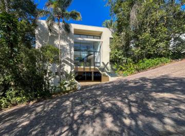 Foto · Casa nova Tela em Branco, 300 mts da praia, no Condomínio Iporanga, Guarujá, SP