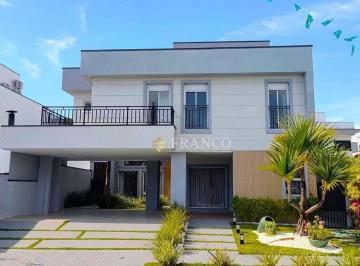 5706a6cf25477573d9870b049ad7d3306ae949c8 · Sobrado com 4 dormitórios para alugar, 306 m² por R$ 10.791,80/mês - Condomínio Ouro Ville - Taubaté