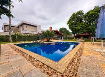 Foto · Casa de alto padrão com piscina e área gourmet no Jardim Acapulco, Guarujá