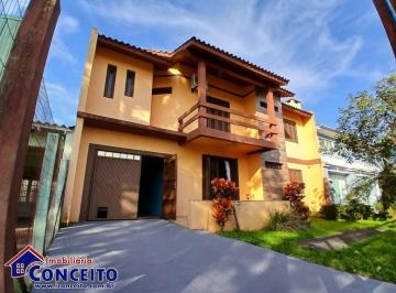 Casa · 4 Quartos · 3 Vagas · C1079 - Excelente residência com piscina no Centro de Imbé