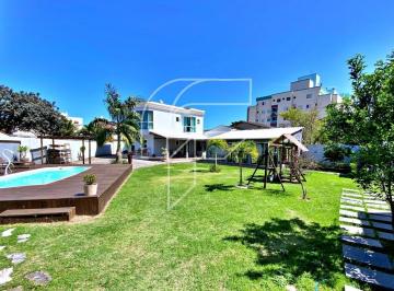 Foto 06 · Luxo e exclusividade na Praia do Morro: casa de praia com 5 quartos, piscina e jardim