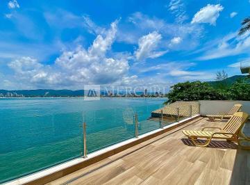 Opções de casas a venda no Guarujá na Praia das Pitangueiras, para quem busca conforto e lazer, pela imobiliária guarujá. · Casa no Guarujá, Condomínio Fechado, Enseada, 3 Quaros, Sendo Suítes e com Varanda Vista Mar - Mercu