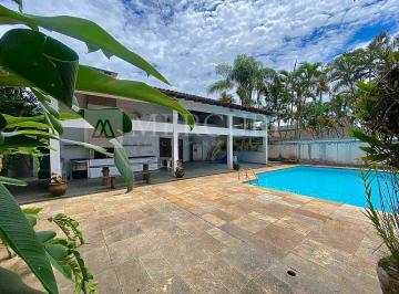 Diversas casas a venda no Guarujá na Praia da Enseada, ideais para sua família, apresentadas por imobiliárias em Guarujá. · Casa no Guarujá, Enseada, Condomínio Fechado, 5 Suítes, Piscina e Churrasqueira - Mercuri Imóveis -