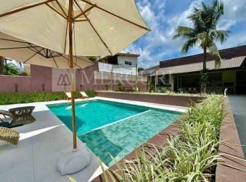 casa a venda no guarujá situada no jardim albamar, exclusiva em imobiliárias em guarujá de alto padrão. · Casa em condomínio fechado à venda em Guarujá, 3 suítes, piscina e recém reformada.