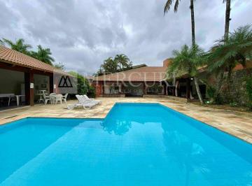 casa a venda no guarujá no condomínio jardim acapulco, anunciada por imobiliárias em guarujá especializadas em imóveis de luxo. · Casa em condomínio fechado à venda na Praia do Pernambuco em Guarujá