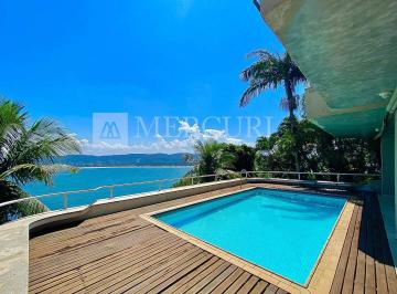 Casa · 500m² · 7 Quartos · 5 Vagas · Casa em condomínio fechado Frente ao Mar à venda na Praia da Enseada em Guarujá.