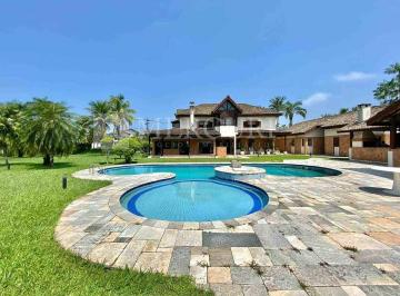 casa a venda no guarujá no condomínio jardim acapulco, anunciada por imobiliárias em guarujá especializadas em imóveis de luxo. · Ampla Residência com 6 Suítes e Amplo Lazer no Condomínio Jardim Acapulco