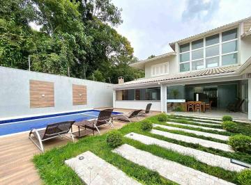 casa a venda no guarujá localizada no jardim pernambuco, disponível em imobiliárias em guarujá referência no litoral. · Casa no Guarujá, Jardim Pernambuco I, Condomínio Fechado, 5 Quartos, Sendo Suítes - Mercuri Imóveis 
