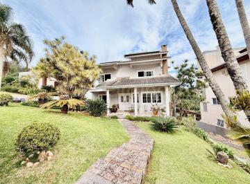 DESTAQUE · Casa de 419m² com 4 quartos sendo 2 suítes em Cacupé