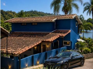 Apartamento de 5 quartos, Angra dos Reis · Exclusiva e imperdível casa à venda, no requisitado condomínio Angra Azul. 4Qtos, st, solarium, 2vgs