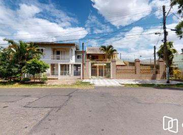 iz6t7x_1560a84b434414d.jpg · Casa em Rubem Berta com 300 m² , 3 quarto(s) , 1 suíte(s) , 5 vaga(s).