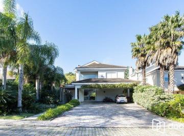 Casa · 458m² · 5 Quartos · 4 Vagas · Casa no Condomínio Las Rocas, vista para o Guaíba, com 5 suítes