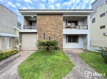 Casa · 385m² · 5 Quartos · 3 Vagas · Casa semimobiliada com 5 dormitórios, piscina e 3 vagas no Camaquã Porto Alegre