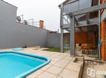 Casa · 245m² · 5 Quartos · 4 Vagas · Casa de 245m² com 5 dormitórios no bairro Sarandi