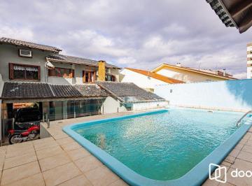 Casa · 208m² · 4 Quartos · 3 Vagas · Casa de 4 dormitórios e 208m² à venda no Bairro Jardim Botânico, Porto Alegre.