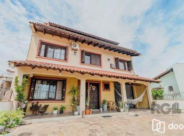 Casa · 234m² · 3 Quartos · 3 Vagas · Casa com 234m², 3 dormitórios, 3 vagas no bairro Partenon