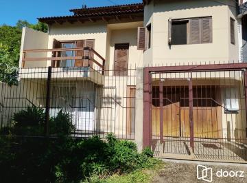 Casa · 287m² · 3 Quartos · 4 Vagas · Casa com 3 quartos, 4 vagas de garagem e com pátio no bairro Parque Santa Fé