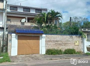 .jpg+2025-03-04 · Casa em Porto Alegre, no bairro Restinga, com 4 dormitório(s), e 4 banheiros, à