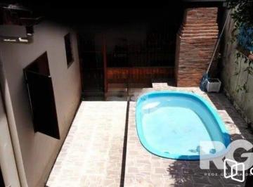 Casa · 132m² · 4 Quartos · 2 Vagas · Casa Ampla com Piscina e 4 Dormitórios no Rubem Berta