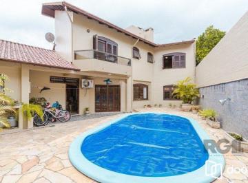 Casa · 295m² · 4 Quartos · 2 Vagas · Casa com 4 dormitórios no bairro Morro Santana