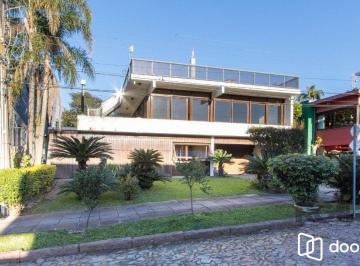 Casa · 375m² · 3 Quartos · 4 Vagas · Casa em condomínio que possui  3 dormitórios, sendo 1suíte, lavabo, escritório,