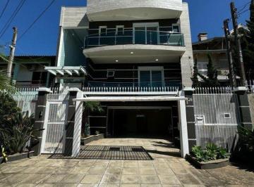 Casa · 342m² · 4 Quartos · 5 Vagas · Casa de altíssimo padrão na zona norte de Porto Alegre.