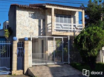 Casa · 200m² · 3 Quartos · 2 Vagas · Casa com 3 dormitórios, suíte, lareira, Jardim Algarve em Alvorada - RS.