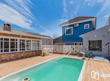 Casa · 128m² · 3 Quartos · 3 Vagas · Casa com piscina e 3 quartos à venda em Cachoeirinha