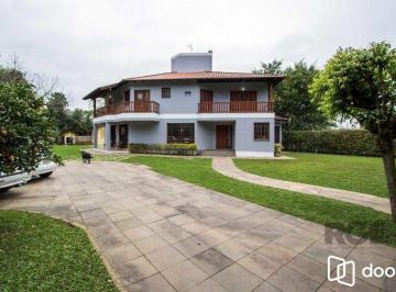 Casa · 321m² · 6 Quartos · 4 Vagas · Sobrado com 6 suites, lareira, lavabo, pátio - Bairro Belém Velho