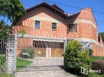 .jpg+2025-03-05 · Casa em Porto Alegre, no bairro Jardim Isabel, com 4 dormitório(s), à venda.
