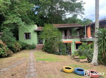 Casa · 200m² · 3 Quartos · 4 Vagas · Terreno de 5.280 m², com 3 casas, no bairro Ponta Grossa, em Porto Alegre.