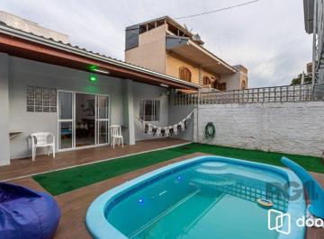 Casa · 157m² · 3 Quartos · 4 Vagas · Casa no Jardim do Salso de 3 dormitórios pátio e piscina
