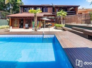 Casa · 330m² · 4 Quartos · 4 Vagas · Casa com 4 dormitórios, suíte, piscina e 4 vagas.