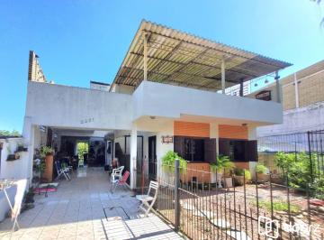 Fachada da casa 2 · Casa à venda - em Cavalhada