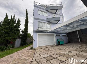 fachada da frente com garagens · Apartamento à venda - na Vila Jardim