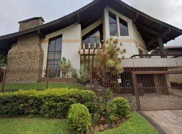 Casa · 647m² · 3 Quartos · 3 Vagas · Casa de 3 dormitórios e 4 vagas de Garagem no Bairro Dom Feliciano em Gravataí.