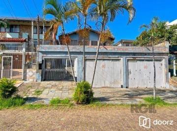 .jpg+2025-03-05 · Casa em Porto Alegre, no bairro Tristeza, com 4 dormitório(s), à venda.