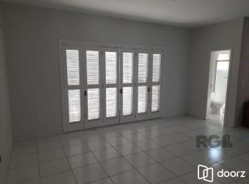 Comercial · 220m² · Oportunidade Imperdível: Prédio com 4 Apartamentos, Pátio e 2 Vagas de Garagem