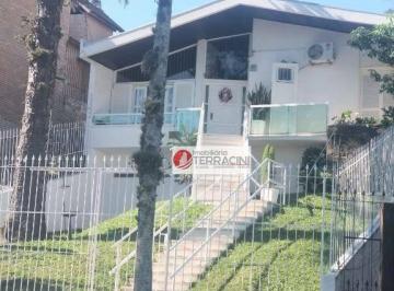1b7e91cc7bf02843aa8fc349c8440d2cdf66bac9 · Casa com 4 dormitórios à venda, 176 m² por R$ 742.000,00 - Parque Santa Fé - Porto Alegre/RS