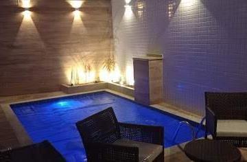 Casa · 150m² · 3 Quartos · 2 Vagas · Casa com 3 dormitórios à venda, 150 m² por R$ 2.438.000,00 - Ponta da Praia - Santos/SP