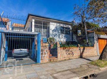 ID79734-fachada(1).jpg.jpeg · Casa à venda em Cavalhada com 220 m², 5 quartos, 3 vagas