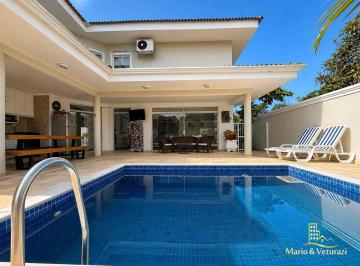 451055f219dee524f8e8f20e3a19a7ea6ec96e11 · Sobrado com 3 dormitórios à venda, 310 m² por R$ 2.000.000,00 - Tombo - Guarujá/SP